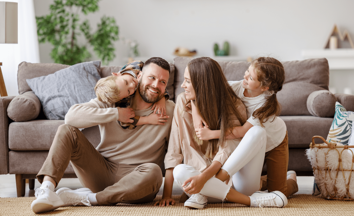 family in the living room of a home